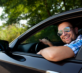 Happy driver with auto insurance in Weston, FL